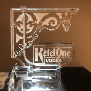 an Ketel One Vodka ice luge of a decorative bracket with a fleur de lis
