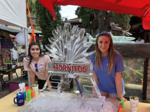 a Hornitos agave tequila luge for Cinco de Mayo, along with its 2 bartenders