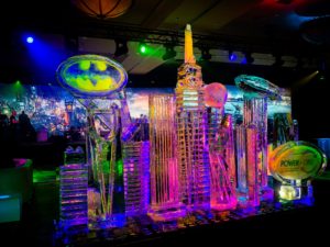 a big ice sculpture of a Gothamish city skyline, by ice dragon ice sculptures