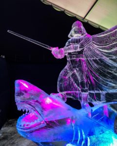 an ice sculpture of Darth Vader riding a great white shark. At a competition in Latvia, sculpted by Dawson List and Joe Rimer