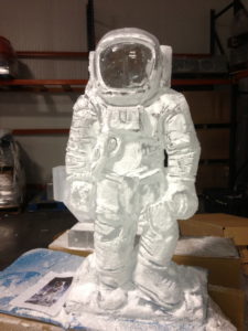 an astronaut ice sculpture by ice dragon ice sculptures