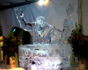 chimpanzee ice sculpture above the Dawn logo from Dawn of the Planet of the Apes
