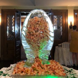 Easter egg shrimp luge filled to the top with shrimp and lit with colored lights