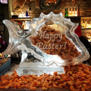 redfish silhouette ice sculpture with shrimp flowing out from inside