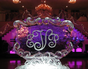 scrollwork monogram wedding ice sculpture with engraved 'EVP'