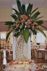 ice palm tree stand for floral by ice dragon ice sculptures at a wedding in Biloxi