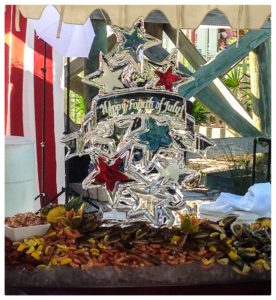 clear ice and colored stars as a Fourth of July holiday ice sculpture