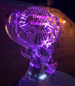 Rudolph the Red Nosed Reindeer as a double ice luge with 'Happy Holidays!' engraved