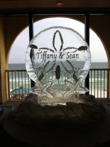 Sand dollar wedding ice sculpture for Tiffany and Sean