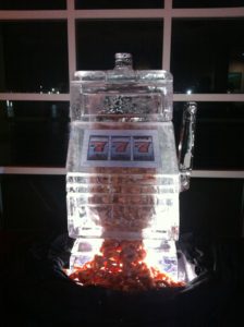 shrimp coming out of a slot machine ice sculpture