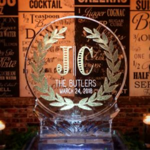 wreath monogram wedding ice sculpture with gold glitter details