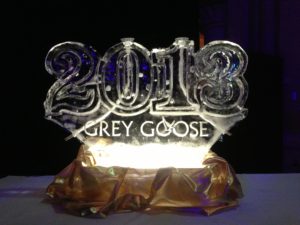 a 2013 ice sculpture with twin ice luges for Grey Goose vodka