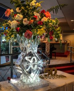 a 50th birthday ice vase for Jennifer at Pensacola Country Club. By ice dragon ice sculptures