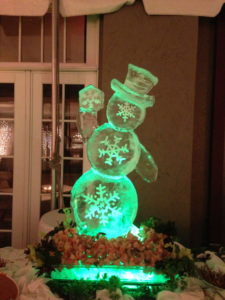 snowman with engraved snowflakes ice sculpture
