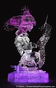 huge ice sculpture of a Native American warrior holding an eagle