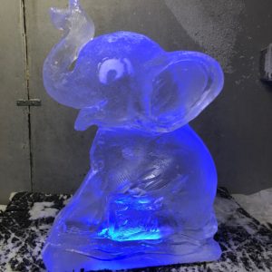 cute baby blue elephant ice sculpture for a baby shower by ice dragon ice sculptures