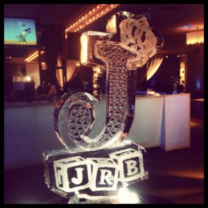 a large "J" and a crown ice sculpture for a baby shower. By ice dragon ice sculptures