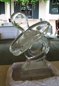 a pacifier ice sculpture at Longue Vue House and Gardens in New Orleans, by ice dragon ice sculptures