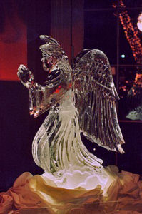praying angel ice sculpture at a Christmas party in New Orleans