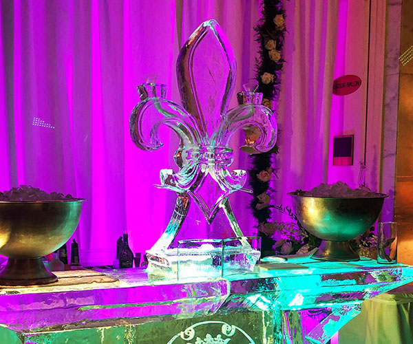 fleur-de-lis ice luge on an ice bar at a wedding at the Omni Royal Orleans in the French Quarter
