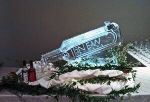 an Old New Orleans Rum bottle ice luge at the New Orleans Museum of Art. By ice dragon ice sculptures