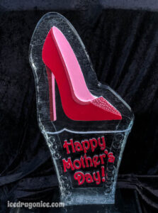 red high heel engraved ice sculpture with Happy Mother's Day by ice dragon ice sculptures