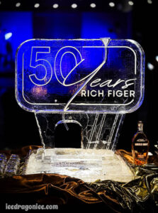 50th birthday ice luge for Rich Figer by ice dragon ice sculptures