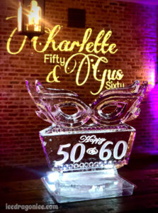 dual birthday masquerade themed ice sculpture for Charlotte and Gus
