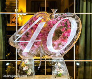 flowered 40th birthday ice luge in Old Metairie by ice dragon ice sculptures
