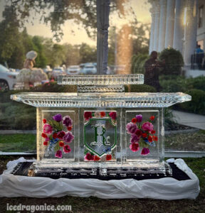 flowered monogram ice bar by ice dragon ice sculptures at a wedding in Biloxi, MS