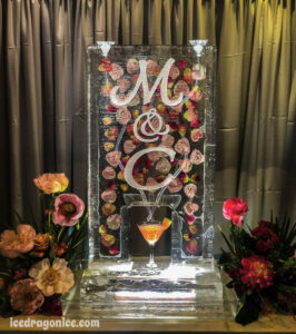 a rose petal ice luge with initials by ice dragon ice sculptures