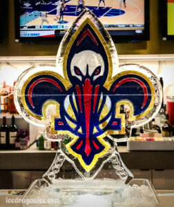 New Orleans Pelicans color logo ice sculpture at the Smoothie King Center