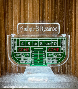 a craps table double ice luge for a wedding with the couple's names