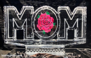 "MOM" with red rose ice sculpture by ice dragon ice sculptures