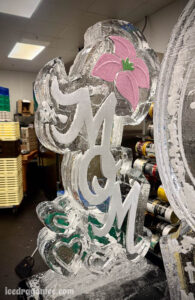 MOM with pink flower ice sculpture, still in the kitchen