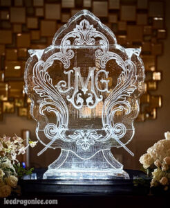 a special JMG monogram ice luge at Southern Oaks, sculpted by ice dragon ice