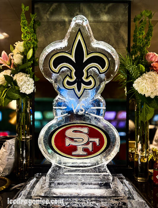 New Orleans Saints fleur de lis and San Francisco 49ers logos ice sculpture by ice dragon ice sculptures